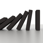 Could you knock down a building using only dominoes?