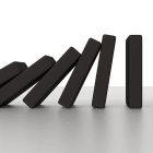 Could you knock down a building using only dominoes?