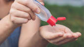 How does hand sanitizer kill germs?