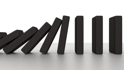 Could you knock down a building using only dominoes?